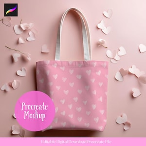 May include: Pink tote bag with white heart pattern and white handles. The bag is surrounded by paper hearts and flowers on a pink background. A pink circle with the text "Procreate Mockup" is in the foreground.