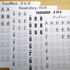 May include: Four sheets of paper with different styles of calligraphy lettering. Each sheet shows the letters A through H in a different font style. The font styles are labeled "Asun Black", "Asun Century", "Asun Sharp", and "Asun Decent".
