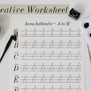 May include: A black and white calligraphy worksheet with the title "Asun Authentic - A to H". The worksheet features a guide for writing the letters A through H in cursive.