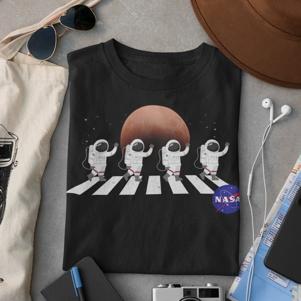 Explore the Cosmos in Style with our NASA Astronaut Shirt - Short-Sleeve Unisex T-Shirt for Space Enthusiasts