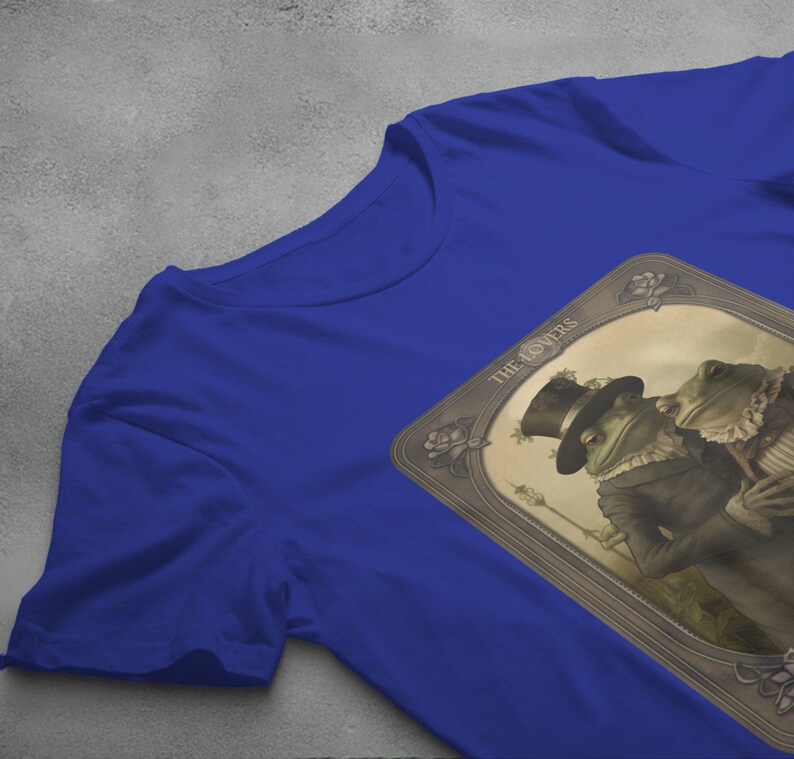 a t - shirt hanging on a clothes line with a picture of a man and