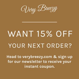 May include: A brown background with white text that reads "Very Breezy" with a line underneath. The text below reads "WANT 15% OFF YOUR NEXT ORDER?" and "Head to verybreezy.com & sign up for our newsletter to receive your instant coupon."
