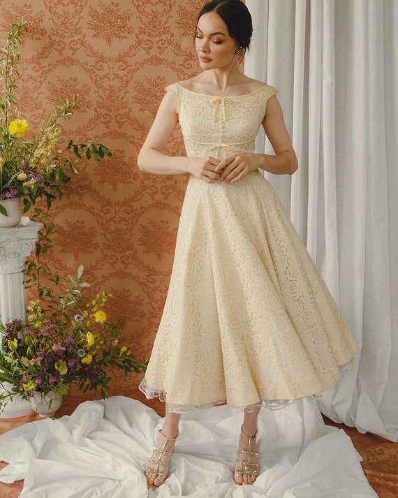 Cream fit and flare dress 2025