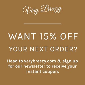 May include: A brown background with the text "Very Breezy" in a cursive font. Below, the text reads "WANT 15% OFF YOUR NEXT ORDER?" and "Head to verybreezy.com & sign up for our newsletter to receive your instant coupon."