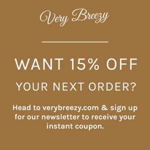 May include: A brown background with white text that reads "Very Breezy" with a line underneath. The text "WANT 15% OFF YOUR NEXT ORDER?" is in large white font. Below that is the text "Head to verybreezy.com & sign up for our newsletter to receive your instant coupon."