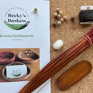 Photo of complete kit including instructions, pine needles, wood center, thread, sewing needle, beads, gauge, and beeswax.