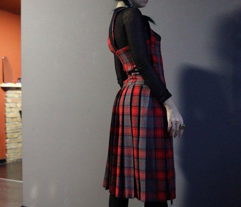 Vintage red tartan check dungaree dress with pleated skirt and fringe