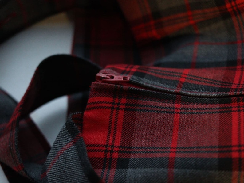 Vintage red tartan check dungaree dress with pleated skirt and fringe