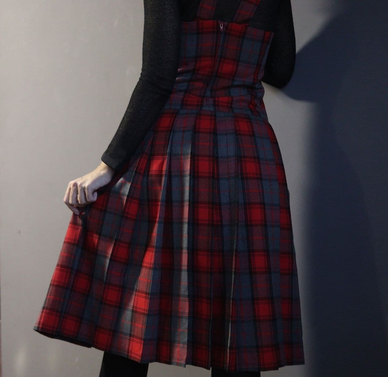 Vintage red tartan check dungaree dress with pleated skirt and fringe