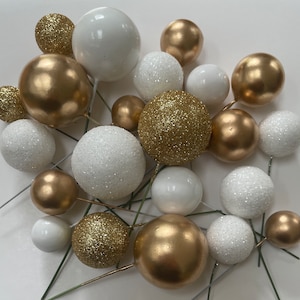 Taartboltoppers, goud-witte taartdecoraties 20st