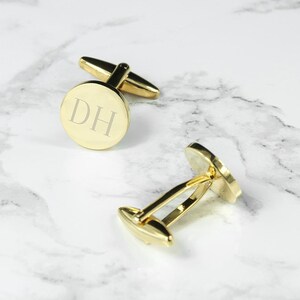 Gemelos redondos personalizados bañados en oro
