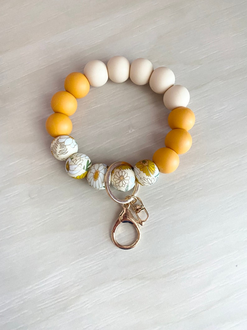 Car Key Holder Silicone Wristlet Keychain Beaded Design Bracelet Bangle Accessory Sunflower Pattern Boho Style Everyday Carry Solution Durable Construction Practical Gift Fashion Statement Piece Modern Look Gold Clasp Detail Teacher Present