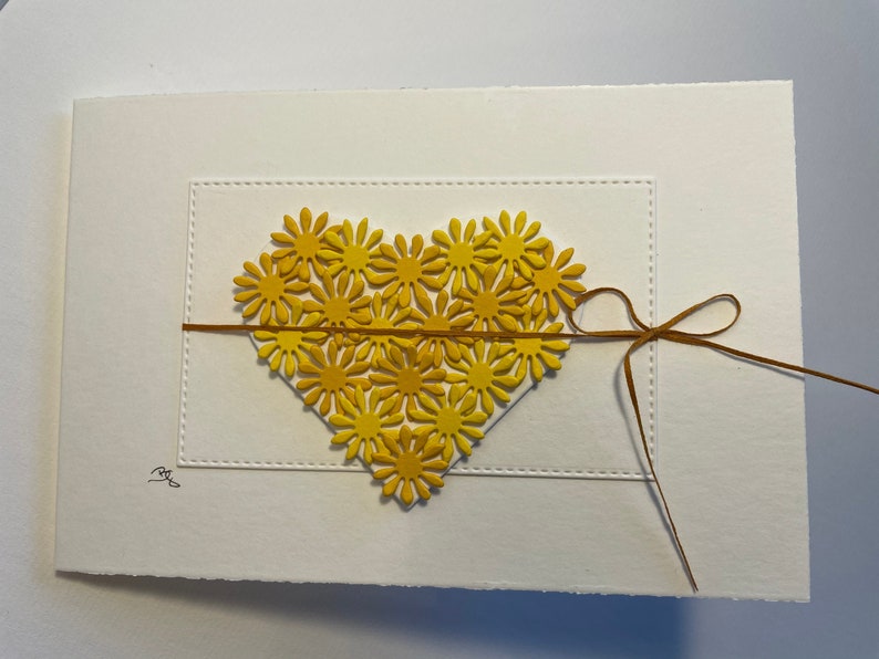 Greeting card with heart Yellow