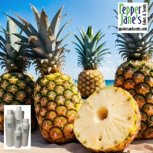May include: Four whole pineapples and one pineapple slice on a sandy beach. The pineapples are green and yellow with brown spiky leaves. The pineapple slice is white and yellow. Four small bottles of liquid are in the foreground. The bottles are labeled "Pepper Jane's Colors & Scents".