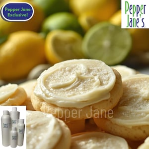 May include: Close-up of frosted cookies with lemons and limes in the background. The cookies have a light brown base and are topped with a thick, white frosting. The image includes the text "Pepper Jane Exclusive!" and "Pepper Jane's".
