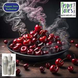 May include: A black bowl filled with red cherries, with steam rising from the bowl. The bowl is on a wooden surface with more cherries scattered around it. Four small bottles with white labels and the text "Pepper Jane" are in the lower left corner of the image.