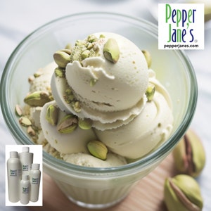 May include: A glass bowl filled with pistachio ice cream, garnished with whole and chopped pistachios. The ice cream is a pale green color. The Pepper Jane's logo is in the upper right corner, and bottles of product are in the lower left.