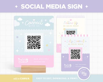 May include: Pastel-colored social media signs with QR codes. One sign says "Connect with Us" and another says "Follow Us on Social Media." A third sign says "Let's Connect on Social Media." The signs are on a wooden base.