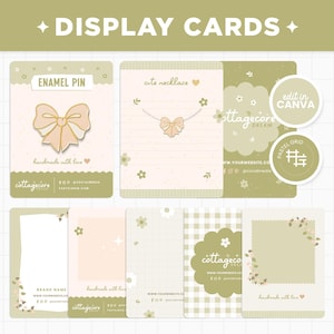May include: A selection of display cards in pastel shades. The cards are designed for enamel pins and necklaces, with text including "DISPLAY CARDS", "ENAMEL PIN", and "cute necklace". Floral and bow designs are featured throughout the cards.