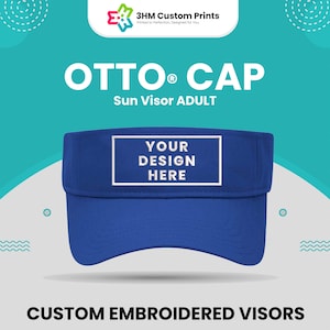 May include: Blue adult sun visor with a white embroidered area for customization. The visor has the text "OTTO® CAP" and "YOUR DESIGN HERE" on it.  Custom embroidered visors.