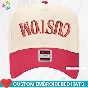May include: A red and natural-colored baseball cap with the word "CUSTOM" embroidered in red. The hat features a mid-profile design and is labeled "OTTO" with "Classic Fit". The image also includes the text "CUSTOM EMBROIDERED HATS".