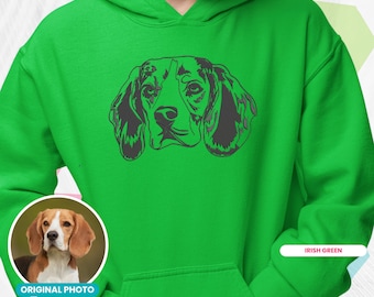 May include: Irish green hoodie featuring a black and gray beagle dog face design. The sweatshirt has a front pocket and a hood. The image also includes a smaller photo of the dog and the text "CUSTOM EMBROIDERED SWEATSHIRT AND HOODIES."
