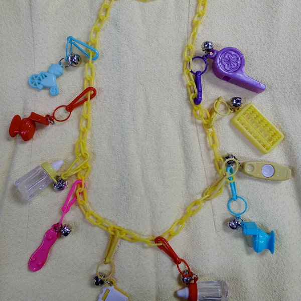 Awsome Vintage kid core  New old 80s bell charms on plastic chain necklace, 10 charms as pictured, toilets and bottles & more. Chain options