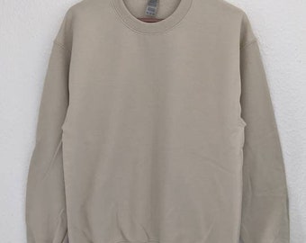 Unisex light sweatshirt in beige. Size M.