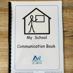 May include: A spiral-bound communication book with a white cover featuring a black line drawing of a stick figure inside a house shape. The text reads My School Communication Book, with the Connect & Learn logo and copyright information below.