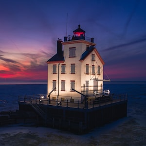Canvas Print of Lorain, Ohio, Lighthouse on a Winter Sunset Aerial Photo