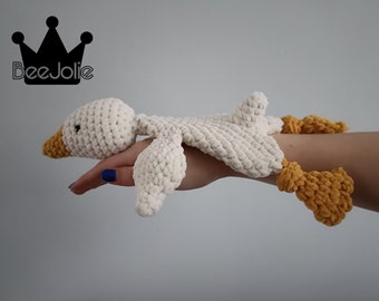 Crocheted mini snuggle goose