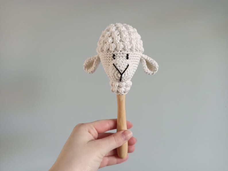 Crocheted samba ball sheep and fox, toy instrument Schaap