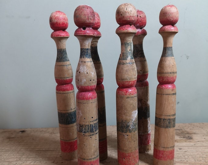 Antique French time worn wooden miniature skittle set