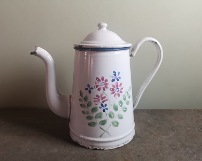 Vintage retro French enamel ware coffee or hot chocolate pot with floral decoration