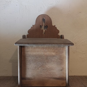 Antique or vintage old French handmade wooden salt box or candle box with decorative cutout design
