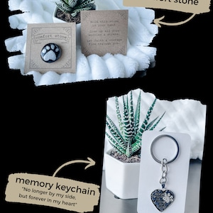 May include: Two comfort stone sets, one with a paw print keychain and the other with a small stone with a paw print. The keychain has the text "No longer by my side, but forever in my heart." The stone has the text "Hold this stone in your hand. Give up all your worries & stress. Let faith & courage flow through you."