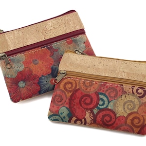 Natural cork purses with warm-toned flower or spiral prints, three practical compartments with zip closure and key hook