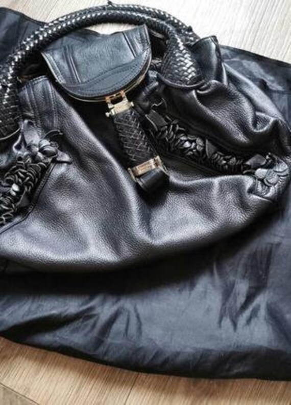 Vintage rare leather designer handbag