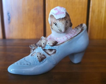 Vintage Royal Albert Potter Old Woman who lived in a shoe porcelain figurine. BP- 6a backstamp.