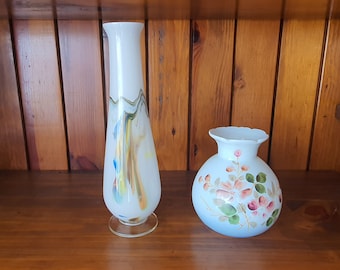 Two glass vases, one tall with abstract design and one round with floral design. Free UK postage.