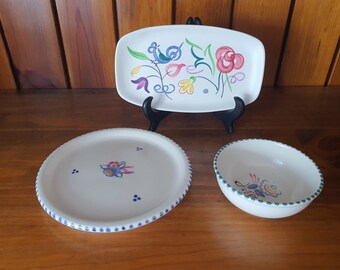 Vintage Poole Pottery various items. Small dish, rectangular plate and circular plate.