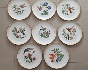 Various limited edition vintage English Bone China plates from the Edward Marshall Boehm Hummingbird Plate Collection.
