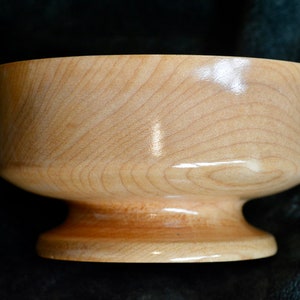 Hand turned straight grained maple pedestal bowl