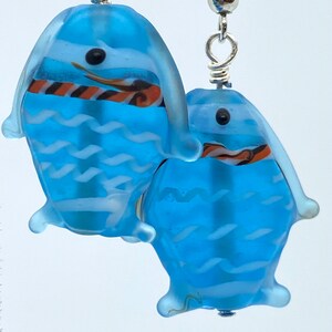 Cute fish earrings of frosted lamp work glass!