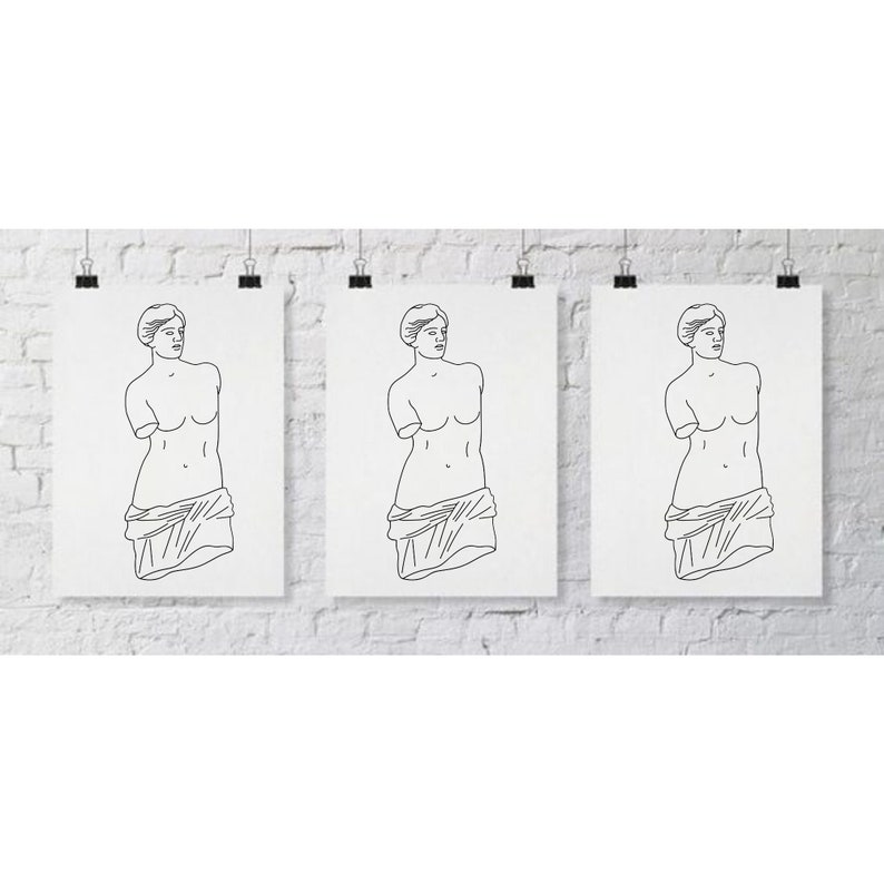 Puede incluir: Tres dibujos en blanco y negro de la estatua de Venus de Milo sobre papel blanco, cada uno enmarcado con un passe-partout blanco y colgado en una pared de ladrillo blanco.
