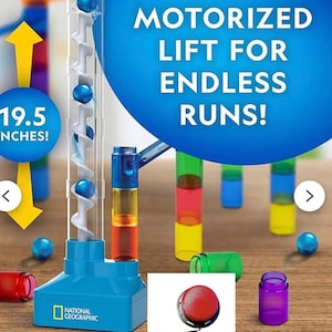 May include: A blue and clear marble run toy with a motorized lift, featuring a spiral track and colorful supports. The toy is 19.5 inches tall and includes the text "MOTORIZED LIFT FOR ENDLESS RUNS!" and the National Geographic logo.