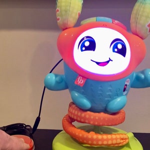 Switch Adapted Fisher-Price DJ Bouncin&#39; Beats toy. Assistive Technology, Special Education / Needs, Speech, Occupational, Physical Therapy.