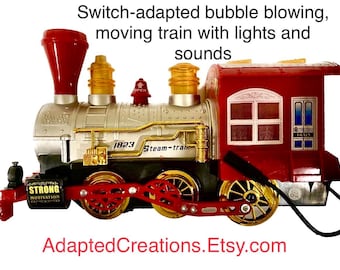 Switch Adapted Bubble Train Toy! Bubble Solution Included. Multi-direction Movement, Music, Lights! Video Link with Sound in the Description