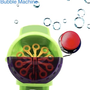 May include: A green and purple bubble machine with a red button. The machine has a light green top and base, with a purple lower section. The text "Switch Adapted Bubble Machine" is at the top. The text "AdaptedCreations.Etsy.com" is at the bottom.