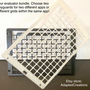 May include: Two clear plastic keyguards for a keyboard. The keyguards are layered on top of each other. The top keyguard is slightly offset from the bottom keyguard. The text "Our evaluator bundle. Choose two keyguards for two different apps or different grids within the same app!" is visible at the top of the image. The text "Etsy store: Adapted Creations" is visible at the bottom of the image.